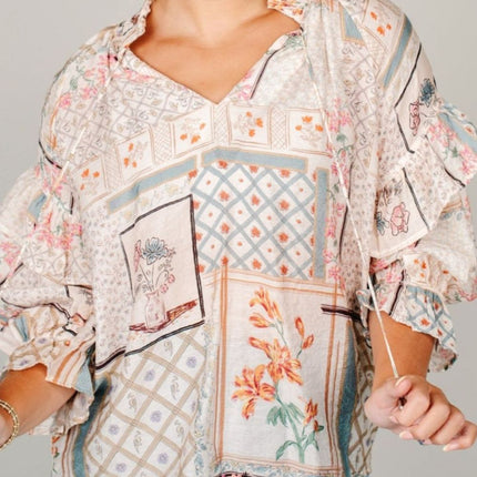 Ruffled Printed Tie Neck Three-Quarter Sleeve Blouse