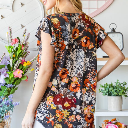 Heimish Full Size Ruffled Floral Round Neck Cap Sleeve Blouse