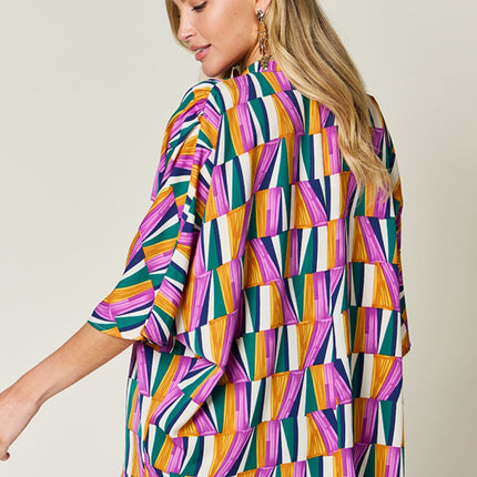 Double Take Full Size Geometric Notched Raglan Sleeve Blouse