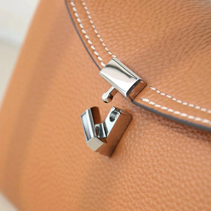 Swedish niche Toteme ladies lychee grain cowhide T-lock buckle simple commuting large-capacity shoulder Messenger bag clutch