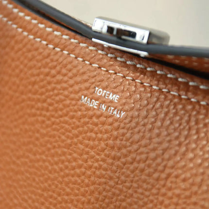 Swedish niche Toteme ladies lychee grain cowhide T-lock buckle simple commuting large-capacity shoulder Messenger bag clutch