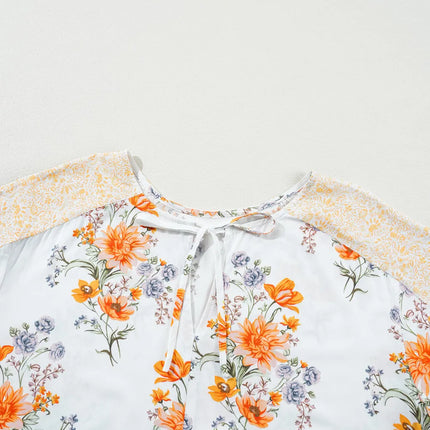 Plus Size Printed Tie Neck Long Sleeve Blouse