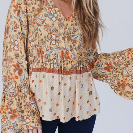 Peplum Printed Surplice Flare Sleeve Blouse