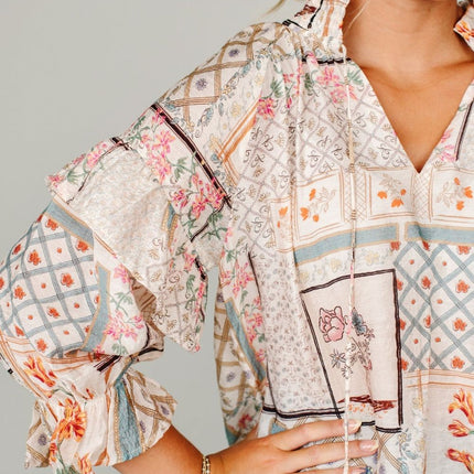 Ruffled Printed Tie Neck Three-Quarter Sleeve Blouse