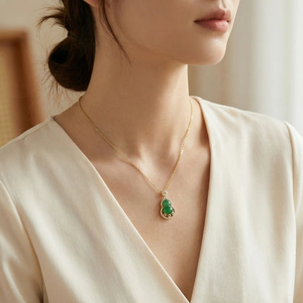925 Sterling Silver Elegant Jadeite Gourd Pendant Necklace Adorned with Sparkling Accents and Floral Leaf Details - JewelryODM