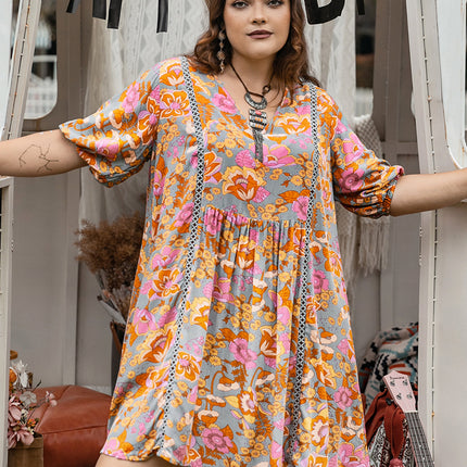 Plus Size Ruched Printed Half Sleeve Mini Dress