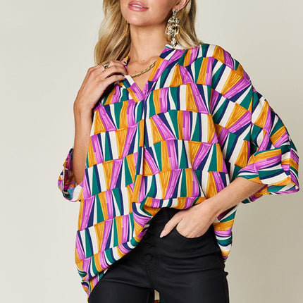 Double Take Full Size Geometric Notched Raglan Sleeve Blouse