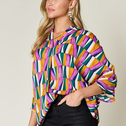 Double Take Full Size Geometric Notched Raglan Sleeve Blouse