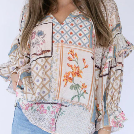 Ruffled Printed Tie Neck Three-Quarter Sleeve Blouse