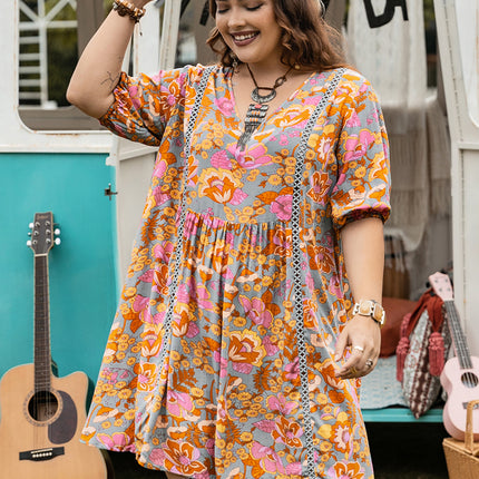 Plus Size Ruched Printed Half Sleeve Mini Dress
