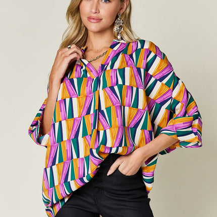 Double Take Full Size Geometric Notched Raglan Sleeve Blouse