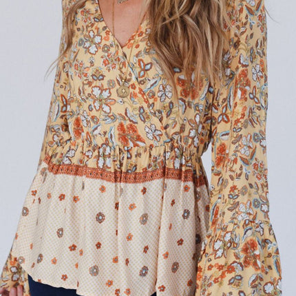 Peplum Printed Surplice Flare Sleeve Blouse