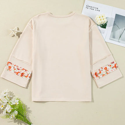 Exposed Seam Slit Floral Round Neck Blouse