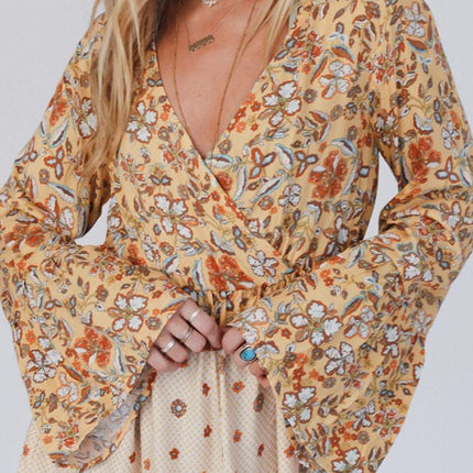 Peplum Printed Surplice Flare Sleeve Blouse