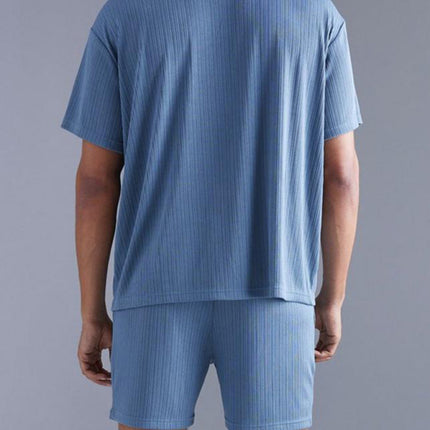 Fashionable and casual solid color dark blue short-sleeved shirt and shorts two-piece men's suit