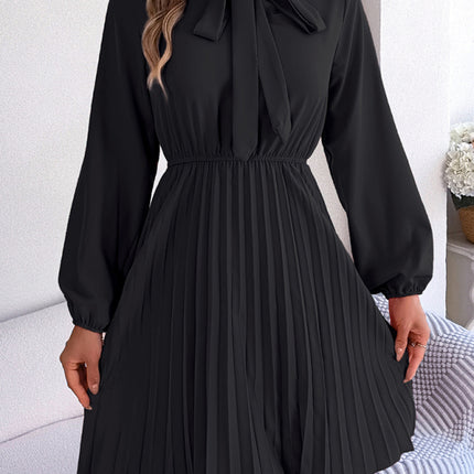 Autumn and winter temperament tie waist long sleeve pleated skirt