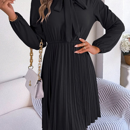 Autumn and winter temperament tie waist long sleeve pleated skirt