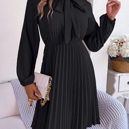 Autumn and winter temperament tie waist long sleeve pleated skirt