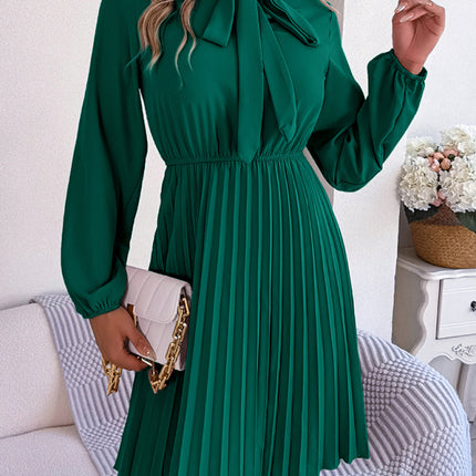 Autumn and winter temperament tie waist long sleeve pleated skirt