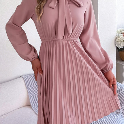 Autumn and winter temperament tie waist long sleeve pleated skirt