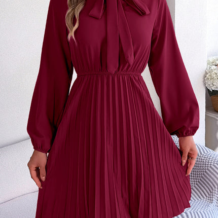 Autumn and winter temperament tie waist long sleeve pleated skirt