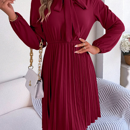 Autumn and winter temperament tie waist long sleeve pleated skirt