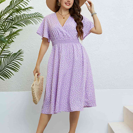 Plus Size Printed Smocked Waist Surplice Dress - Vickie Lynn's