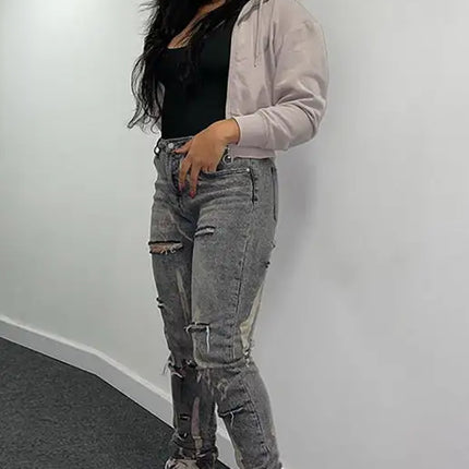 Vaqueros ajustados blancos lavados con cintura alta y cremallera para mujer 