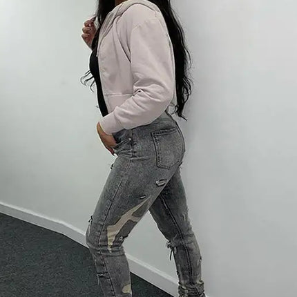 Vaqueros ajustados blancos lavados con cintura alta y cremallera para mujer 