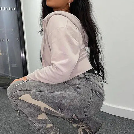 Vaqueros ajustados blancos lavados con cintura alta y cremallera para mujer 