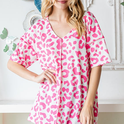 Heimish Full Size Leopard Exposed Seam Short Sleeve Top