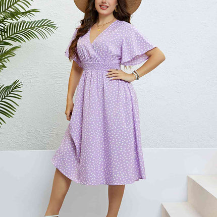 Plus Size Printed Smocked Waist Surplice Dress - Vickie Lynn's