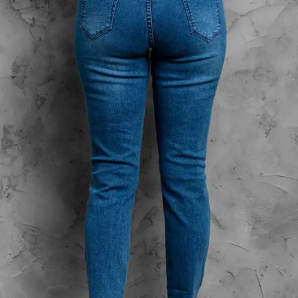 Vaqueros clásicos de talle medio, rasgados, ajustados y lavados 