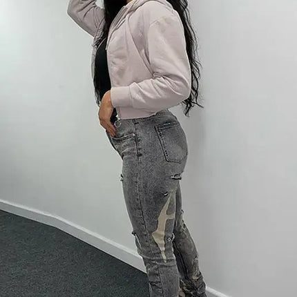 Vaqueros ajustados blancos lavados con cintura alta y cremallera para mujer 