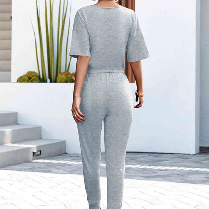 Buttoned Half Sleeve Round Neck Jumpsuit