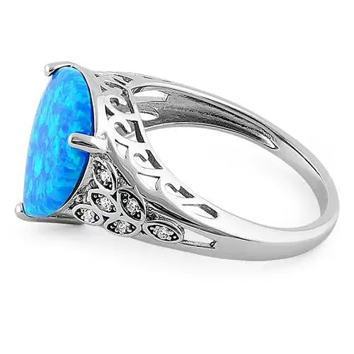 Plump Pear Shape Blue Lab Opal Clear CZ Ring