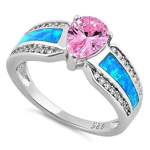 Anillo ilustre de ópalo azul, corte de pera rosa y circonita transparente 