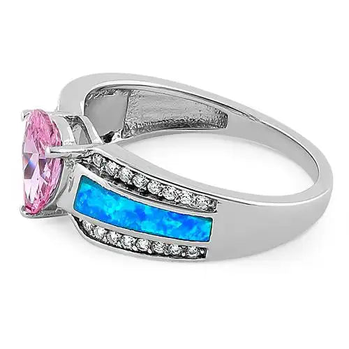 Anillo ilustre de ópalo azul, corte de pera rosa y circonita transparente 