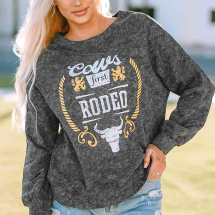 Mineral Washed COW'S FIRST RODEO Round Neck Raglan Sleeve Sweatshirt