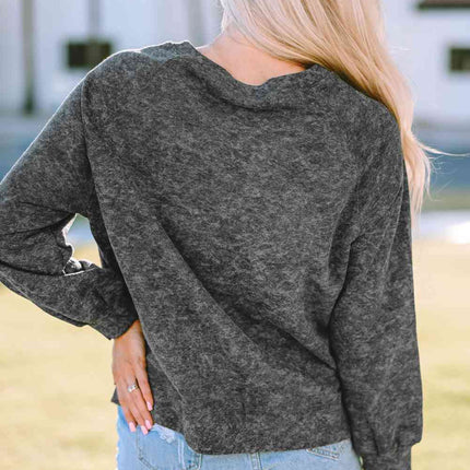Mineral Washed COW'S FIRST RODEO Round Neck Raglan Sleeve Sweatshirt
