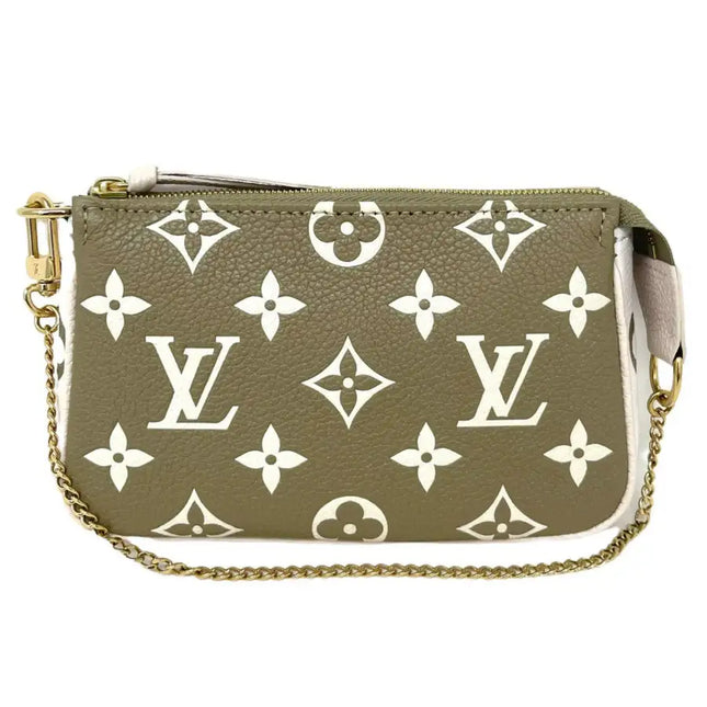 NUEVO Louis Vuitton LV Monogram Empreinte Mini Pochette de cuero Accesorios Bolso de mano Primavera en la ciudad