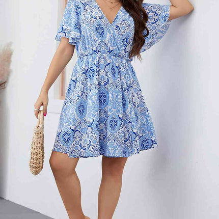 Plus Size Surplice Neck Flutter Sleeve Dress - Vickie Lynn's