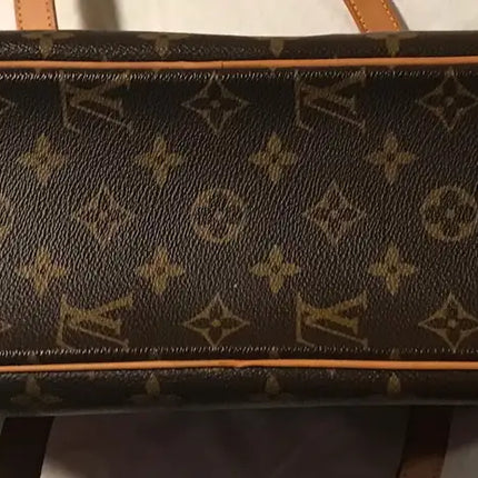 Louis Vuitton Cite Monogram purse