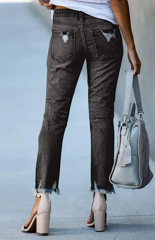 Vaqueros pitillo desgarrados con cremallera y bragueta unicolor para mujer 