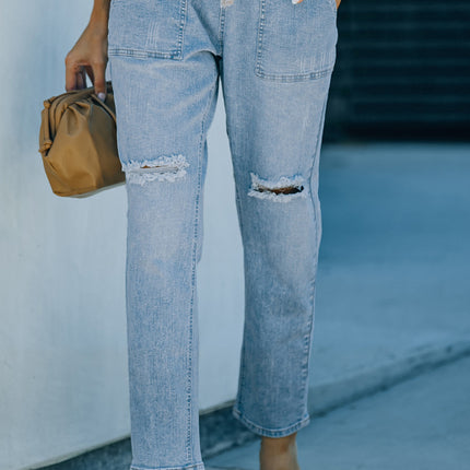 Jogger de mezclilla con bolsillos desgastados y cordón ajustable desgastado 