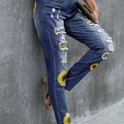 Jeans de cintura alta desgastados con estampado de girasol y patchwork de leopardo 