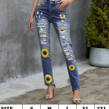 Jeans de cintura alta desgastados con estampado de girasol y patchwork de leopardo 