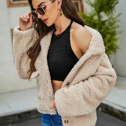 Abrigo de piel suelto de moda de manga larga con bolsillo de un solo pecho con solapa nueva de otoño para mujer 