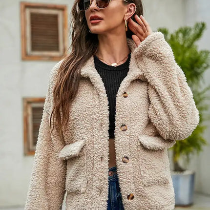 Abrigo de piel suelto de moda de manga larga con bolsillo de un solo pecho con solapa nueva de otoño para mujer 