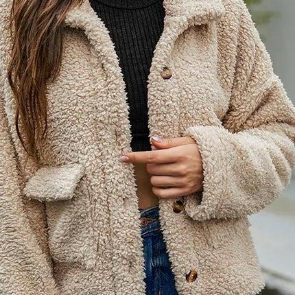 Abrigo de piel suelto de moda de manga larga con bolsillo de un solo pecho con solapa nueva de otoño para mujer 